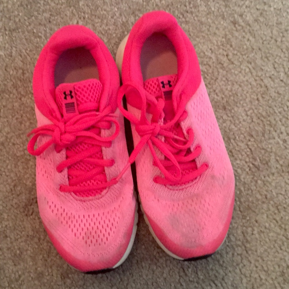 Pink runner shoes or basketball shoes
